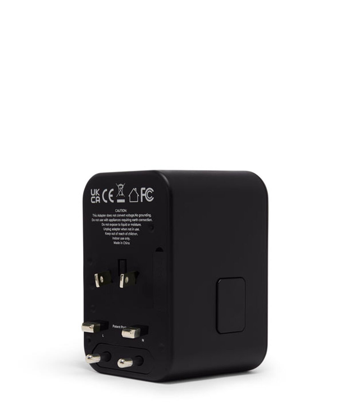 TUMI Adaptador de corriente universal 65W