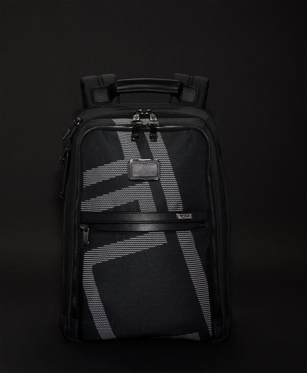 Tumi reflective top
