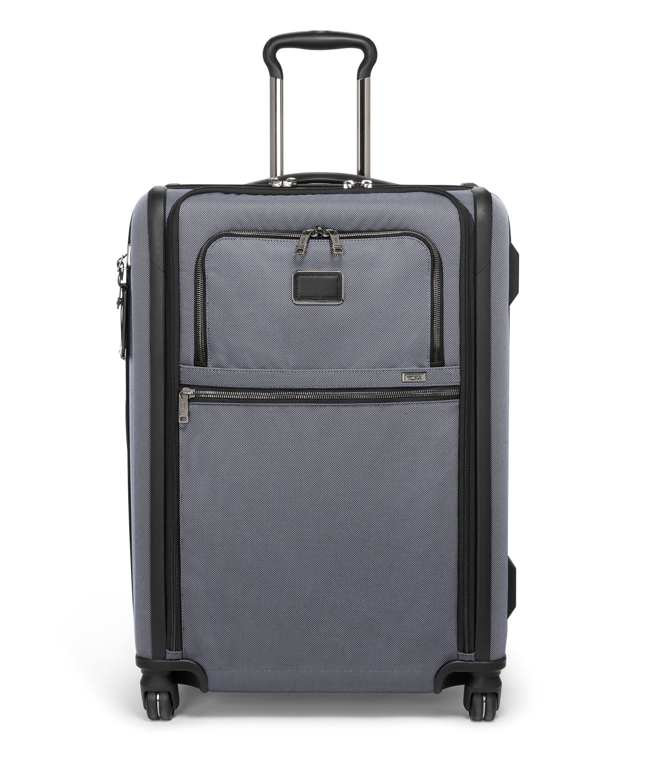 Tumi checked luggage top