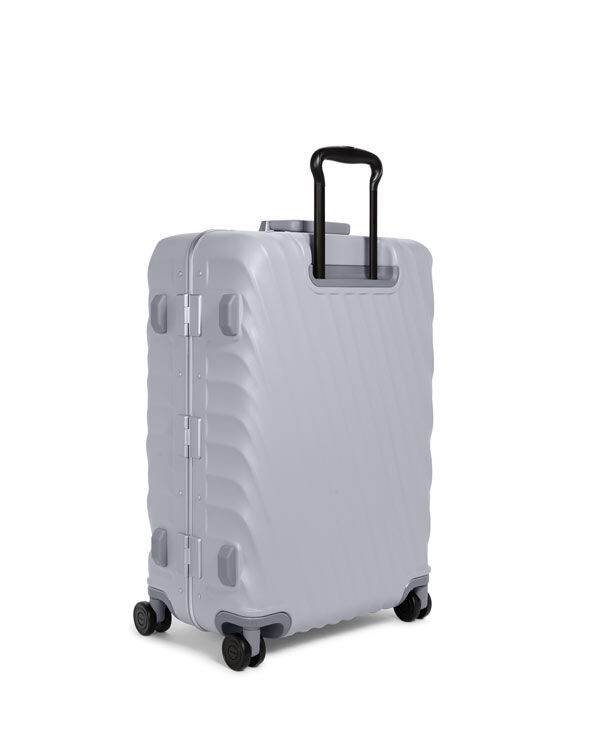 Tumi checked luggage top
